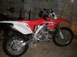 HONDA CRF 250 2009 honda crf 250, only done 35miles. red, ....